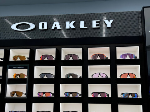 Athens, Greece - January 14, 2025:Oakley Performance Sunglasses Display Wall in Retail Store