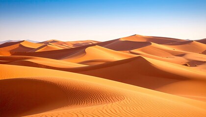 Vast Desert Landscape Featuring Rolling Sand Dunes Under a Clear Blue Sky in Warm Sunlight During Golden Hour