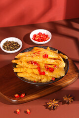 Spicy Pickled Chicken Feet with Red Chilies Traditional Asian Cuisine Appetizer on Wooden Serving Tray