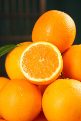 Fresh Orange Citrus Fruits Cut in Half Showing Juicy Interior for Healthy Summer Nutrition