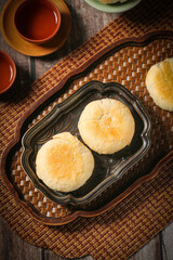 Traditional Chinese Mooncakes with Tea for Mid-Autumn Festival Reunion Celebration