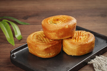 Traditional Golden Mooncakes with Egg Yolk for Mid-Autumn Festival Chinese Cultural Food