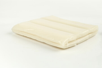 Rice Paper Wrappers for Spring Rolls and Asian Cooking on White Background