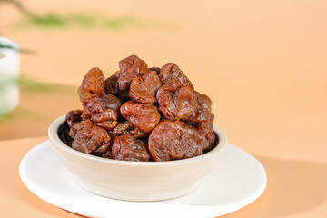 Dried Raisins or Dates in White Bowl - Healthy Natural Snack Food Ingredients