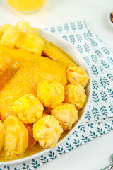 Fish Maw Soup with Chicken Meatballs in Gold Broth - Traditional Chinese Cuisine