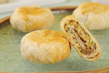Traditional Chinese Mooncakes with Mixed Filling for Mid-Autumn Festival Holiday Celebration