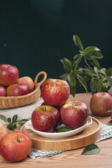 Sweet Red Fuji Apples from Xinjiang Display on Rustic Wooden Table with Natural Styling