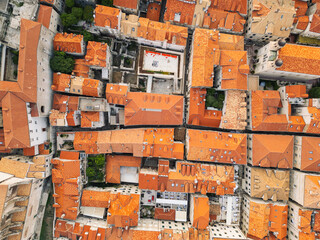 red clay tile rooftops in Dubrovnik Croatia taken by drone photo