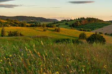 Landscape of the hills on the outskirts of Kamienna Góra during beautiful sunset on a summer afternoon, Lower Silesia, Poland. © stockcrafter