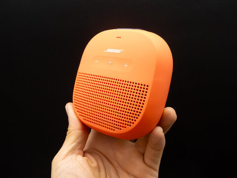 Zapopan Jalisco, Mexico - September 15, 2025: Orange Bose portable Bluetooth speaker, bose speaker concept