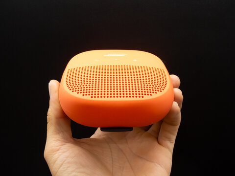 Zapopan Jalisco, Mexico - September 15, 2025: Orange Bose portable Bluetooth speaker, bose speaker concept