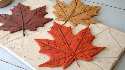 “Minimal Abstract Fall Leaves Render in Clay Style”