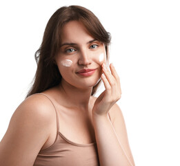 Fototapeta premium Beautiful woman with cream on her face against white background