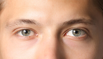 Fototapeta premium Closeup view of man with beautiful eyes