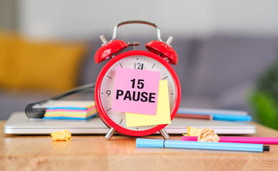 Red alarm clock sticker and text 15 Pause, pause concept, business concept
