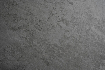Gray stone textured surface photographed from above