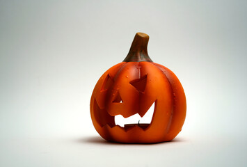 Halloween jack-o-lantern isolated on white background symbolizing spooky holiday decoration,...