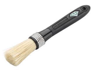 Closeup of a black detailing brush isolated on transparent background