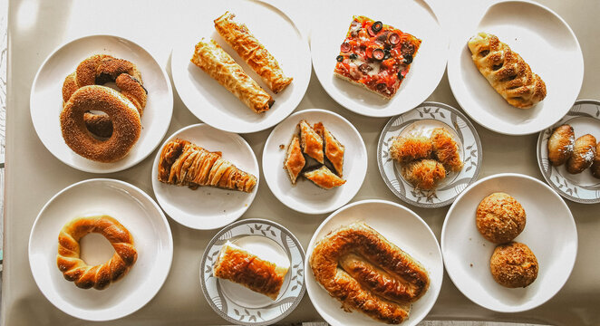 Delicious meat kebab with fresh vegetable salad served with variety of Turkish dishes and appetizers. Top view of assorted Turkish food and meze, tasty and healthy Mediterranean cuisine. Top view.