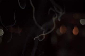 Birthday Cake with Candles that spell "Not Dead Yet" - blown out, funny b-day concept title screen, candle letters create joke message for aging or old person. Zoom in. Fly over.