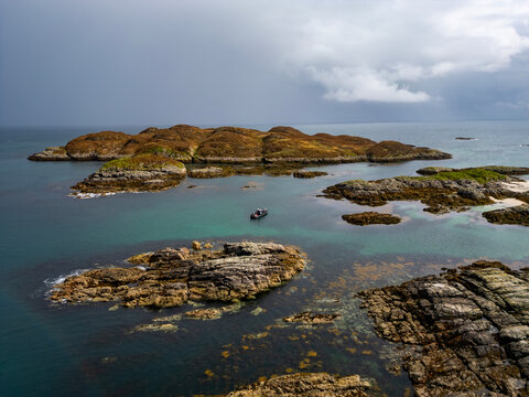 An aerial view of the rocky coast on the north end of the Isle of Coll in Argyll and Bute, Scotland