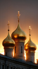Obraz premium Golden Domes against Sunset Hues: A captivating shot of three elegant golden domes, each adorned with crosses, set against a striking sunset sky, evoking a sense of peace and spirituality.