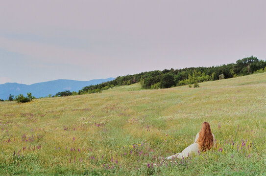 Back View of Woman in Field