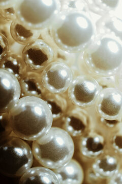 Close-up View of Shimmering Pearls Arranged Together