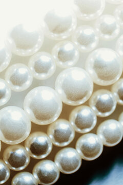 Beautiful Strands of Pearls Displayed Elegantly on a Soft Background