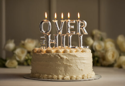 Birthday Cake with Candles that spell "Over The Hill" - funny 40th b-day concept, candle letters create humorous message for forty year old bday.