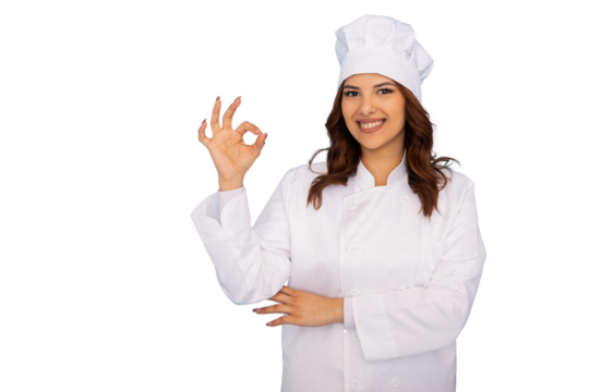 Confident female chef grinning, signaling approval with hand gesture, wearing professional kitchen attire against clean white background