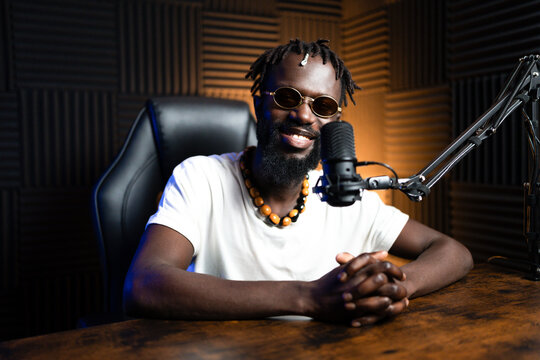 Content creator recording a podcast in professional studio