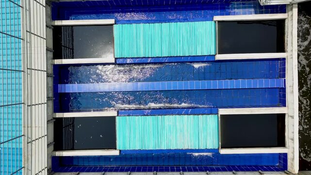 Clean Water Purification Channels in Modern Wastewater Treatment Plant Aerial Footage