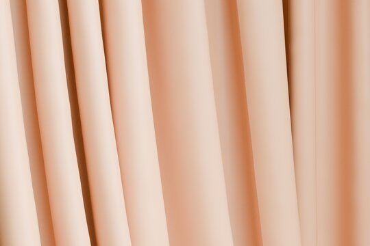 Soft abstract 3D background with vertical peach fabric folds