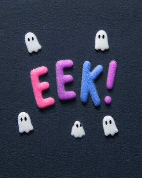 Eerie halloween night horror and child-safe spookinessEerie Halloween night with colorful letters spelling spooky horror eek surrounded by child
