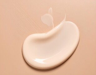 Creamy cosmetic product smear on beige background.