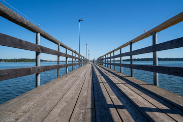 Wooden jetty in the lake 