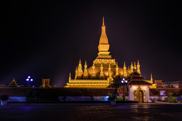 Pha That Luang a gold buddhist stupa in the night, landmark of Vientiane, Laos PDR.