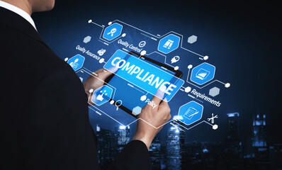 A businessman in a suit uses a tablet to navigate compliance strategies, showcasing various icons related to quality control and policy in a modern digital setting. Tessel