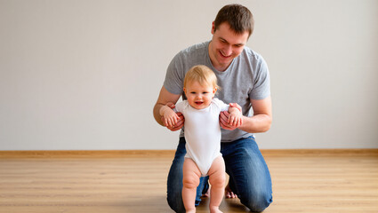 A loving father crouches down to help his smiling toddler take their first steps. The image captures a tender, joyful milestone in a child's development, highlighting the supportive role of a parent.