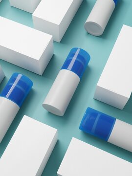 White and blue cosmetic bottles with packaging on blue background