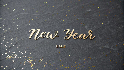 Fototapeta premium New Year Sale sign with golden particles on a black textured background