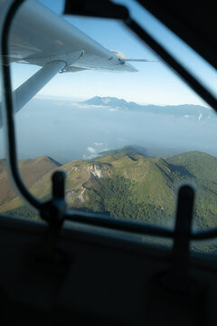 Volcanic Mountain Landscape in Java Seen Through Aircraft Window