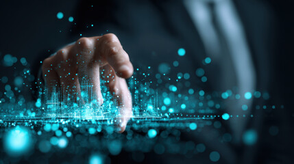 Person reaching out with hand towards digital interface filled with glowing blue particles and data visualizations, symbolizing technology and innovation. scene conveys sense of connection
