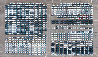 New cars parked at port trade center lot aerial view