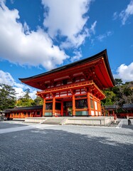 Ancient Japanese temple gate under a vast sky