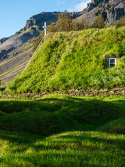 Green roof of traditional turf church in Hof, Iceland