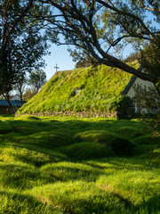 Green roof of traditional turf church in Hof, Iceland