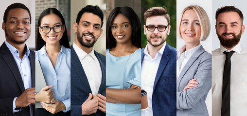 A diverse group of business professionals is standing close together, showcasing teamwork.