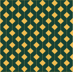 Small gold diamond shaped decorations hanging on thin gold threads, against a dark green background